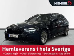 Svart Begagnad 2021 BMW 520 M Sport Kombi | 369 900 kr (Marknadspris)