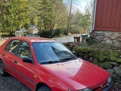 Röd Begagnad 1991 Nissan Sunny Halvkombi | 12 000 kr