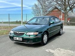 Mörkgrön Begagnad 1998 Mazda 626 Halvkombi | 23 000 kr