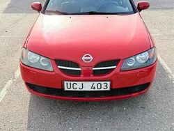 Röd Begagnad 2003 Nissan Almera Halvkombi | 24 900 kr (Marknadspris)
