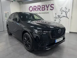 Svart Ny 2025 Mazda CX-60 Homura-Line SUV | 599 900 kr (Marknadspris)