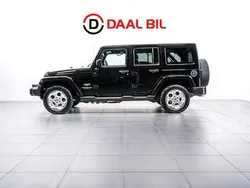 Svart Begagnad 2015 Jeep Wrangler Unlimited Sahara SUV | 329 700 kr (Marknadspris)