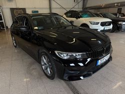 Svart Begagnad 2022 BMW 320 Sport Line Kombi | 249 900 kr