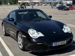 Svart Begagnad 2003 Porsche 911 Carrera Sportkupé | 319 000 kr
