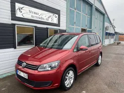 Röd Begagnad 2012 VW Touran Minibuss | 84 900 kr