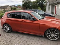 Orange Begagnad 2013 BMW M135 Halvkombi | 190 000 kr (Marknadspris)