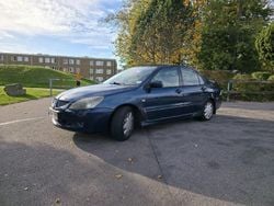 Blå Begagnad 2004 Mitsubishi Lancer Sedan | 14 900 kr (Marknadspris)