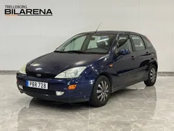 Mörkblå (blå) Begagnad 2000 Ford Focus Ghia Halvkombi | 12 900 kr (Marknadspris)
