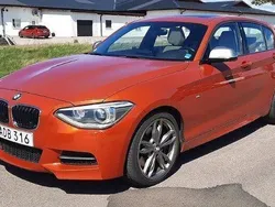 Orange Begagnad 2013 BMW M135 Halvkombi | 269 000 kr (Superpris)