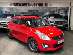 Röd Begagnad 2016 Suzuki Swift Halvkombi | 89 900 kr (Marknadspris)