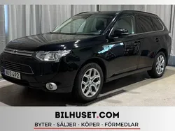 Svart Begagnad 2014 Mitsubishi Outlander P-HEV SUV | 79 000 kr (Bra pris)