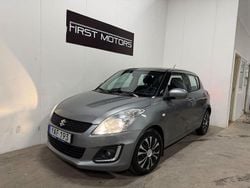 Mörkgrå Begagnad 2015 Suzuki Swift Halvkombi | 105 900 kr (Marknadspris)