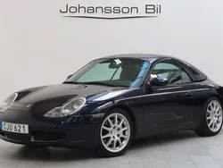 Mörkblå Begagnad 2000 Porsche 911 Carrera 4 Cabriolet Cab | 329 900 kr