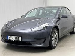Grå Begagnad 2021 Tesla Model 3 Standard Range Sedan | 209 000 kr (Marknadspris)