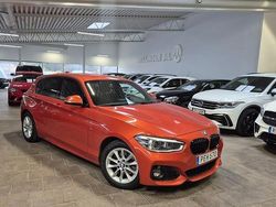 Orange (valencia orange metallic) Begagnad 2017 BMW 120 M Sport Halvkombi | 169 000 kr (Marknadspris)