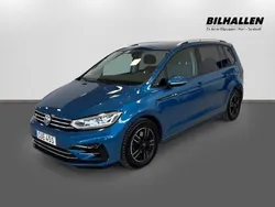 Ljusblå Begagnad 2019 VW Touran Minibuss | 249 900 kr (Marknadspris)