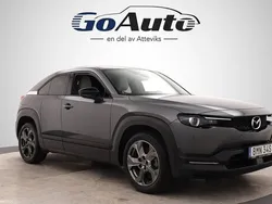 Grå Begagnad 2021 Mazda MX30 Cosmo SUV | 179 500 kr (Marknadspris)