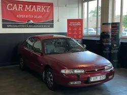 Mörkröd Begagnad 1992 Mazda 626 Halvkombi | 19 900 kr