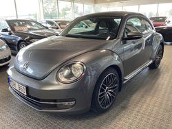 Mörkgrå Begagnad 2011 VW Beetle Halvkombi | 64 900 kr (Lite dyr)