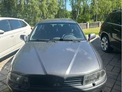Grå Begagnad 2003 Mitsubishi Carisma Halvkombi | 22 000 kr (Marknadspris)