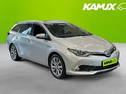 Silver/grå Begagnad 2015 Toyota Auris Hybrid Executive Kombi | 162 900 kr (Marknadspris)