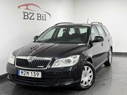 Svart Begagnad 2012 Skoda Octavia Ambiente Kombi | 79 900 kr (Marknadspris)