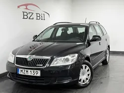 Svart Begagnad 2012 Skoda Octavia Ambiente Kombi | 79 900 kr (Marknadspris)