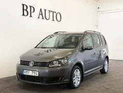 Mörkgrå Begagnad 2012 VW Touran Minibuss | 89 900 kr (Marknadspris)