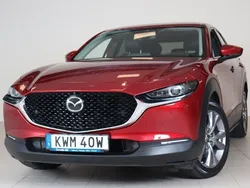 Röd Begagnad 2021 Mazda CX-30 Cosmo SUV | 239 900 kr (Marknadspris)