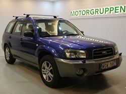 Mörkblå (blå) Begagnad 2004 Subaru Forester SUV | 59 900 kr (Lite dyr)