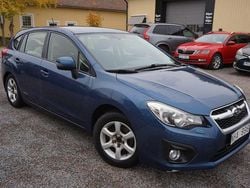 Mörkblå Begagnad 2013 Subaru Impreza Halvkombi | 89 900 kr (Marknadspris)