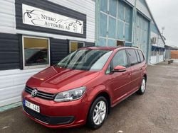 Röd Begagnad 2011 VW Touran Minibuss | 84 900 kr (Lite dyr)