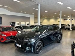 Svart Begagnad 2023 Mazda CX-60 Homura-Line SUV | 479 900 kr (Marknadspris)