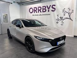 Brun Begagnad 2022 Mazda 3 Homura-Line Halvkombi | 239 500 kr (Marknadspris)
