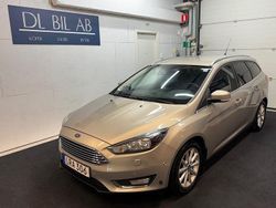 Grå Begagnad 2015 Ford Focus Titanium Kombi | 74 900 kr (Marknadspris)