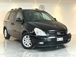 Svart Begagnad 2007 Kia Carnival Minibuss | 39 000 kr
