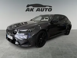Grå Begagnad 2025 BMW M5 Comfort Edition Kombi | 1 699 000 kr