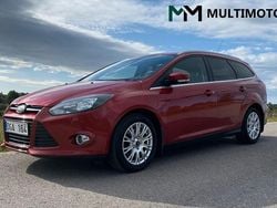 Röd (red candy tint) Begagnad 2012 Ford Focus Titanium Kombi | 64 900 kr (Lite dyr)
