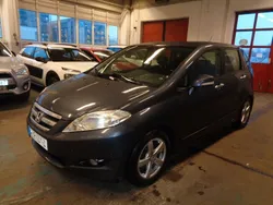 Mörkgrå Begagnad 2005 Honda FR-V Minibuss | 29 900 kr (Marknadspris)