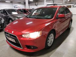 Mörkröd Begagnad 2011 Mitsubishi Lancer Sportback Halvkombi | 39 900 kr (Marknadspris)