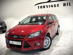 Röd Begagnad 2014 Ford Focus Titanium Kombi | 49 900 kr (Marknadspris)