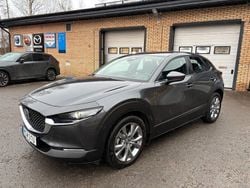 Machine grey metallic Begagnad 2023 Mazda CX-30 Exclusive-Line SUV | 298 500 kr (Lite dyr)