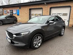 Machine grey metallic Begagnad 2023 Mazda CX-30 Exclusive-Line SUV | 298 500 kr (Marknadspris)
