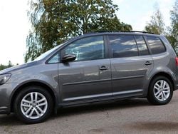 Grå Begagnad 2015 VW Touran Minibuss | 119 000 kr (Superpris)