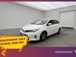Vit Begagnad 2015 Toyota Auris Hybrid Edition Kombi | 137 800 kr (Marknadspris)