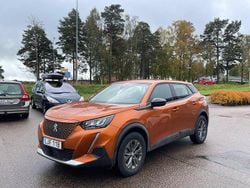 Orange Begagnad 2022 Peugeot e-2008 Active SUV | 188 900 kr (Marknadspris)