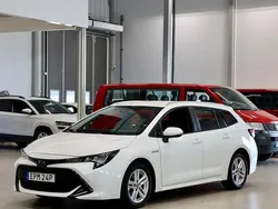 Vit Begagnad 2019 Toyota Corolla Hybrid Kombi | 217 400 kr (Marknadspris)