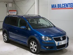 Mörkblå Begagnad 2009 VW Touran Cross Freestyle Minibuss | 49 900 kr (Lite dyr)