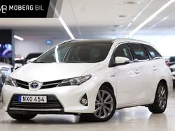 Vit Begagnad 2013 Toyota Auris Hybrid Executive Kombi | 134 900 kr (Marknadspris)