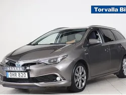 Mörkgrå Begagnad 2016 Toyota Auris Hybrid Executive Kombi | 154 900 kr (Marknadspris)